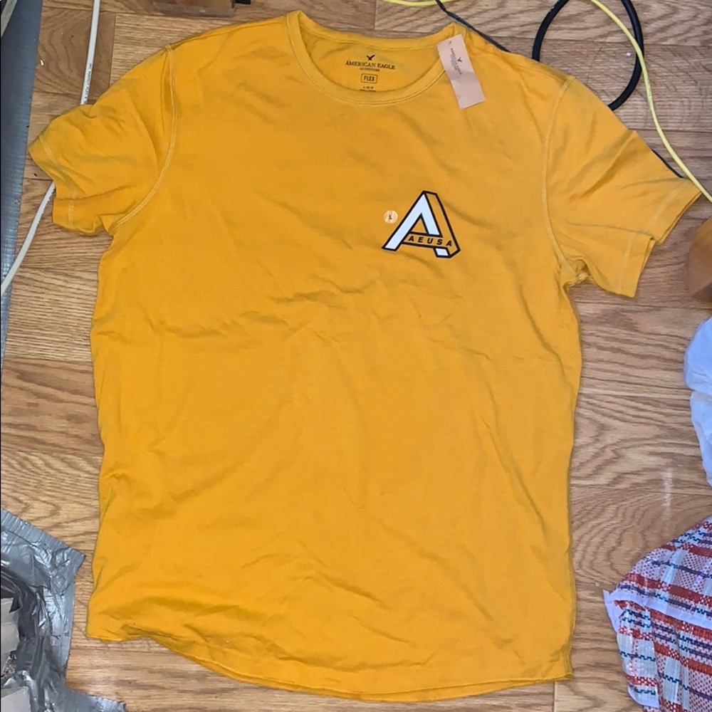 Yellow American eagle short sleeve t shirt.